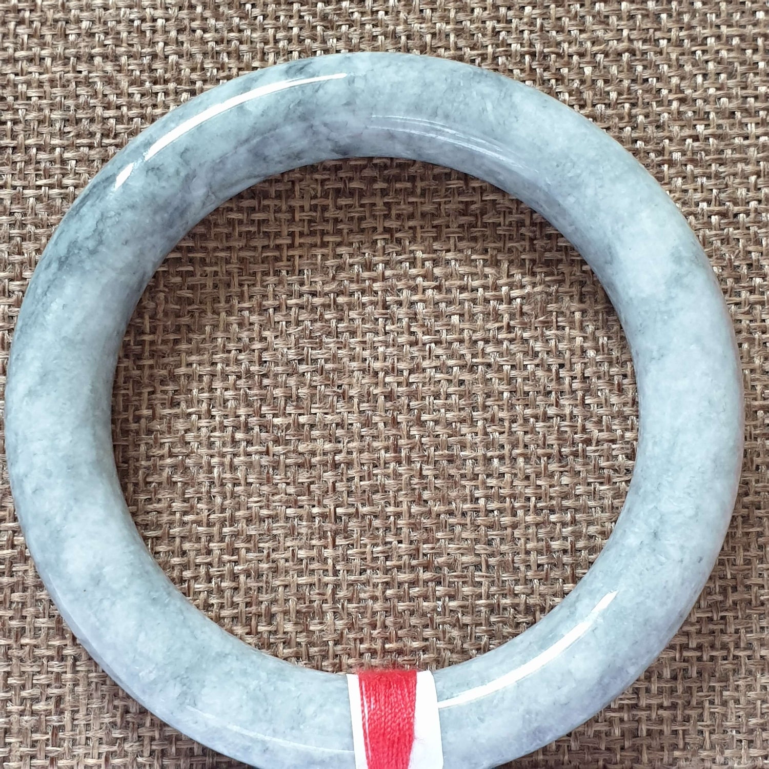 56mm Ash Grey Type A Jadeite Jade Bangle (乌鸡翡翠圆条手镯) BGL76744