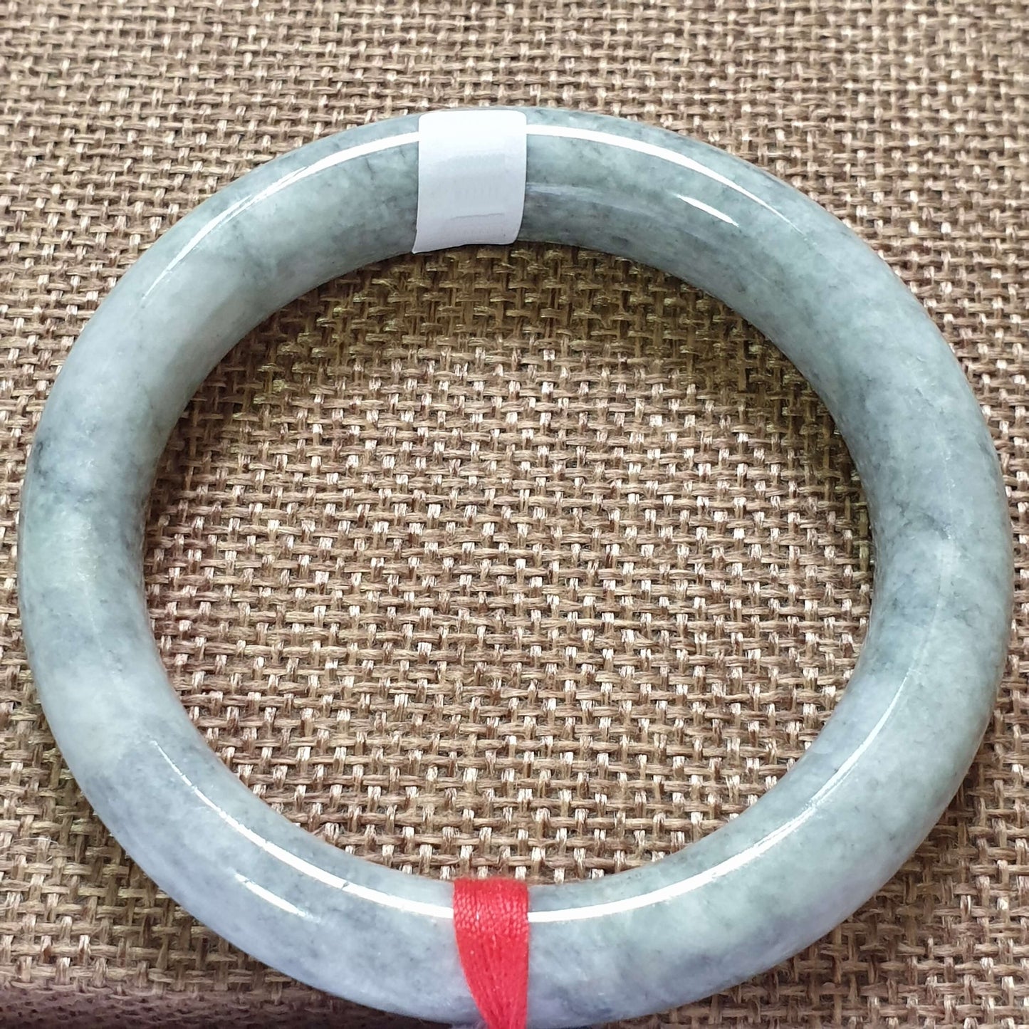 56mm Ash Grey Type A Jadeite Jade Bangle (乌鸡翡翠圆条手镯) BGL76764